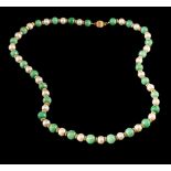 A cultured pearl and jadeite necklace,: the alternating 6.8mm cultured pearls and 7.