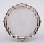 An Elizabeth II silver salver, maker HyC, Sheffield, 1963: of plain circular form, with moulded rim,