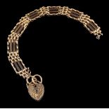 A 9 carat gold gate link bracelet,: composed of polished links, with a 9 carat gold padlock clasp,
