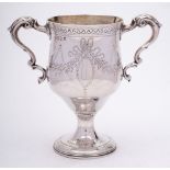 A George III silver twin handled cup, maker Matthew West, Dublin,