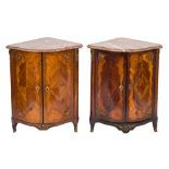 A matched pair of late 18th century French kingwood and gilt metal mounted serpentine fronted