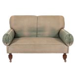A metamorphic upholstered 'sleeper sofa', early 20th century,: with later green fabric coverings,