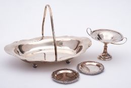 A George V silver swing-handled bread basket, maker G H Inshaw & Co, Birmingham,