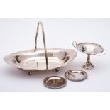 A George V silver swing-handled bread basket, maker G H Inshaw & Co, Birmingham,