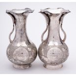 A pair of Chinese silver vases, stamped marks: bears Chinese inscription, of ovoid outline,