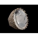A silver and rutilated quartz dress ring,