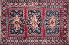 A Kashmir rug:, of Caucasian design,