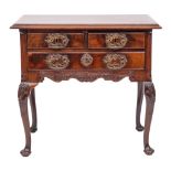 A George II mahogany and later carved lowboy:, the rectangular top with a moulded edge,