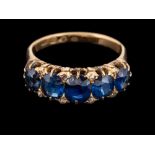 An 18 carat gold sapphire and diamond ring,