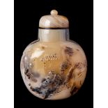 A large Chinese 'Suzhou' agate snuff bottle and stopper: of flattened rounded form,