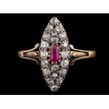 A ruby and diamond ring,: the navette shaped panel set with a central rectangular cut ruby,