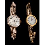A gold wristwatch,: the white dial with black Arabic numerals and steel hands, the case stamped 18,