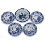 A set of four Japanese Arita blue white dishes and a deep plate: the four painted with pheasants,
