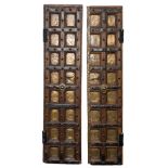 A pair of Indian hardwood and iron mounted, studded and panelled doors:,