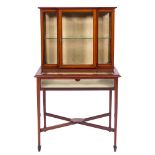 An Edwardian mahogany and inlaid display cabinet:, crossbanded in satinwood,