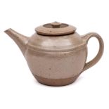 *Richard Batterham [1936-2021] a stoneware teapot and cover: of traditional form with ribbed strap