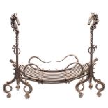 A 20th Century wrought iron fire basket: the concave basket suspended between stylised equestrian