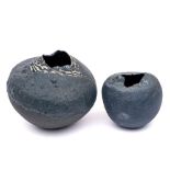 *Vinitha McWhinnie [1821-2004] two handbuilt stoneware vases: the matt blue oviform bodies with