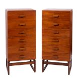 A pair of G-Plan 'Quadrille' teak six drawer cabinets,:- raised on square section supports,
