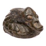 A carved and polished serpentine marble head of a sea creature: in the manner of Frank Dobson,