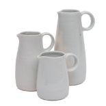 *John Davidson [1936-2005] three graduating porcelain jugs: of tapering cylindrical form,