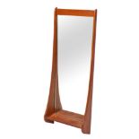 A G-Plan teak wall mirror: the beveled rectangular plate in a swept frame with open shelf beneath,