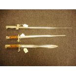 A WWI period German S84/98 bayonet: together with a French 1886 Lebal pattern bayonet and a