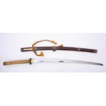 A 20th century katana: the blade over square brass tsuba and cord bound grip with gilt brass