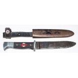 A WWII Hitler Youth knife by Eickhorn in poor condition.