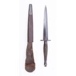 A WWII Second pattern Fairbairn Sykes Fighting knife: the straight double edge blade over 2 inch