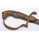 An Imperial German Officer's sword: with 77cm etched blade, brass knuckle guard,