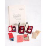 Two Imperial Service medals in cases of issue: one to Ruben J Hill, with certificate,