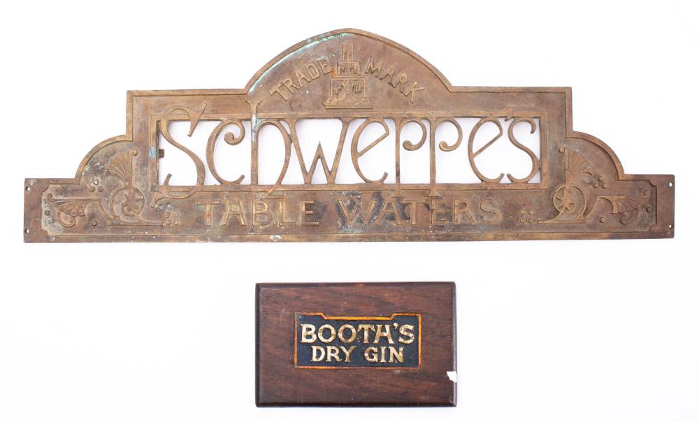 A late 19th/early 20th century brass 'Schweppes Table Waters' sign: with lancet arch and trade mark,