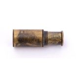 A WWII RAF/ SOE miniature brass telescope: single draw, 3.2cm closed, 4.2cm extended.