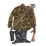 A NATO Camouflage Combat Smock: together with a pair of black leather boots,