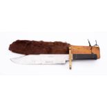 A large 'I XL' Bowie knife by G Wostenholm & Son,Sheffield: , clipped back blade ,