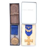 A German Armed Forces 40 Year Long Service Medal: 25 year cross with additional oakleaves and eagle