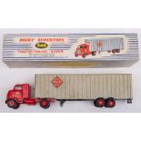 Dinky 948 Tractor Trailer 'McLean': in red and silver with black treaded tyres, in original box.