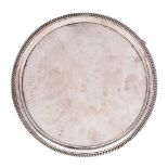 A George III circular silver salver, maker Peter & William Bateman, London, 1807: initialled,