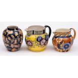 Two Wood & Sons Bursley Ware jugs and a vase: one jug tube lined in pattern 194, 15cm high,