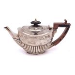 A Victorian batchelor's silver teapot, maker William Hutton & Sons Ltd, London,
