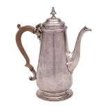 A George II silver coffee pot, maker CW probably Charles Woodward, London,