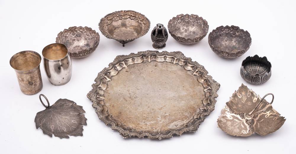 A collection of Indo-Persian and Middle Eastern silver wares: including a salver, bowls,