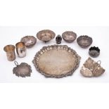 A collection of Indo-Persian and Middle Eastern silver wares: including a salver, bowls,