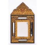 A Dutch ebonised wood and gilt repousse metal mounted wall mirror in 17th century style,