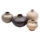 A Chinese brown glazed squat globular jar and three similar celadon glazed jars: the smallest with