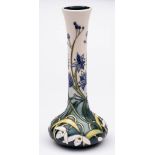 WITHDRAWN A Moorcroft pottery limited edition vase: of squat form with slender waisted neck tube