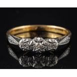 An 18 carat gold and diamond ring,: set with three eight-cut diamonds, stamped 18k,