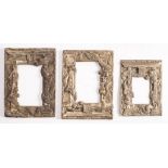 Three Chinese antimony frames: with low relief decoration of dragons entwined around temple gates,