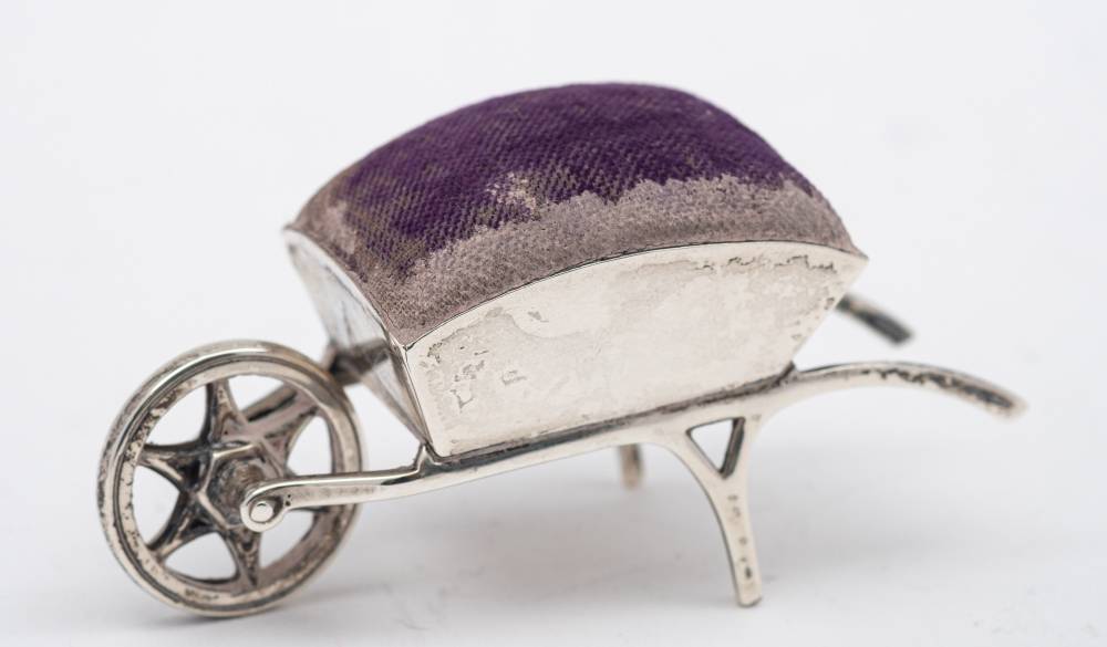 An Edward VII silver novelty pin cushion, maker Adie & Lovekin Ltd, Birmingham,